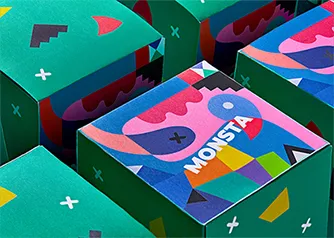 Colorful custom folding boxes with bold graphic branding arranged in a grid