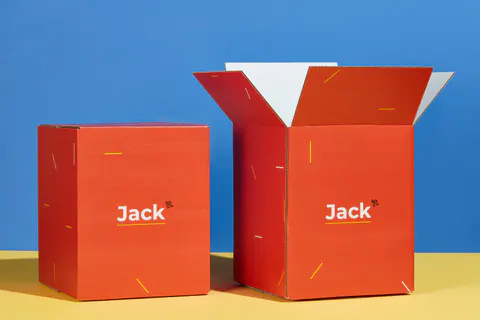 Two custom printed shipping boxes, one closed and one open with its flaps up